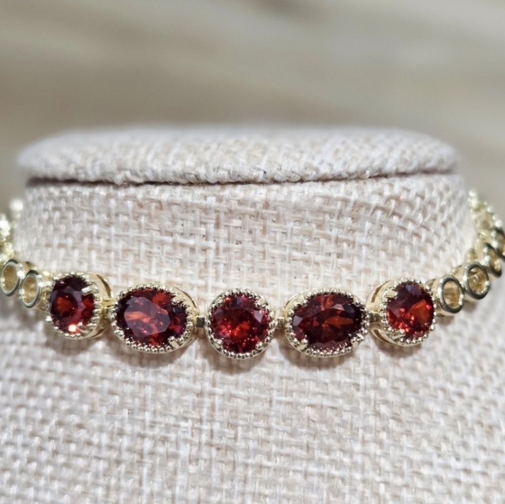 Elegant Gold And Red Gemstone Bracelet